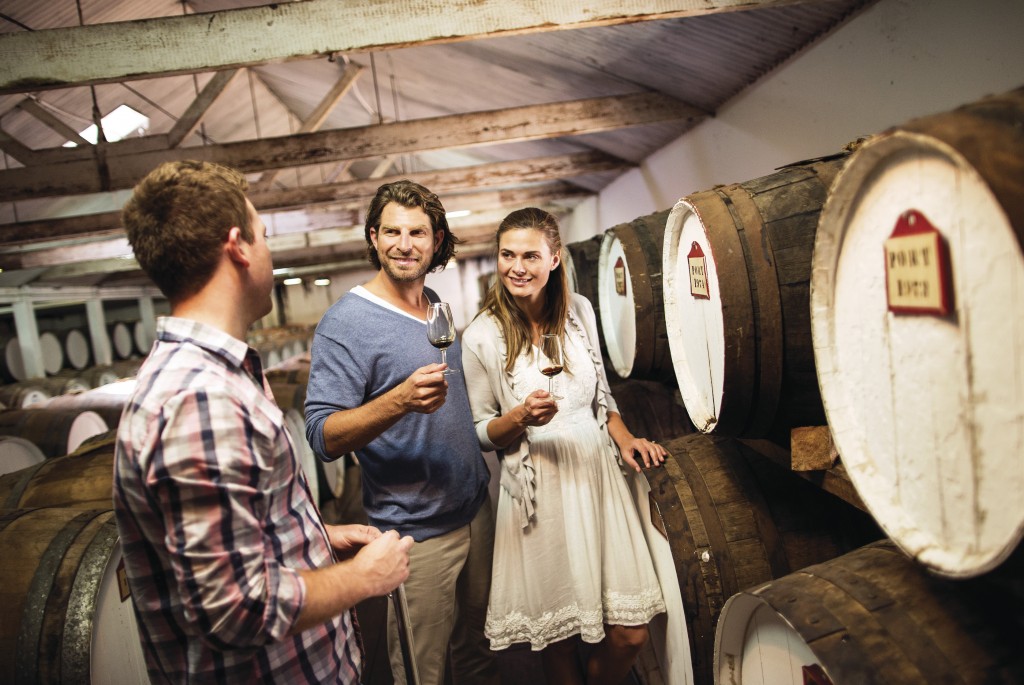 Couple enjoying tour of cellar door at Seppeltsfield Estate