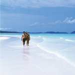 Couple walking on Whitehaven Beach