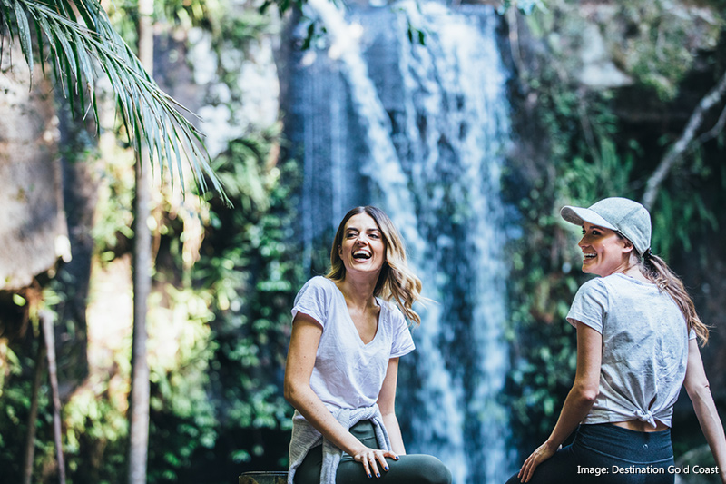 Mount Tamborine women laughing at falls and walking Witches Fall Bush Walk