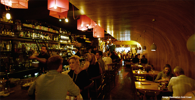 People in a busy bar Etsu at night